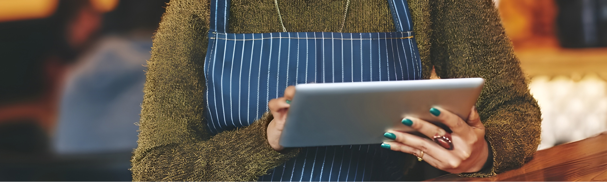 A person looking on a tablet 